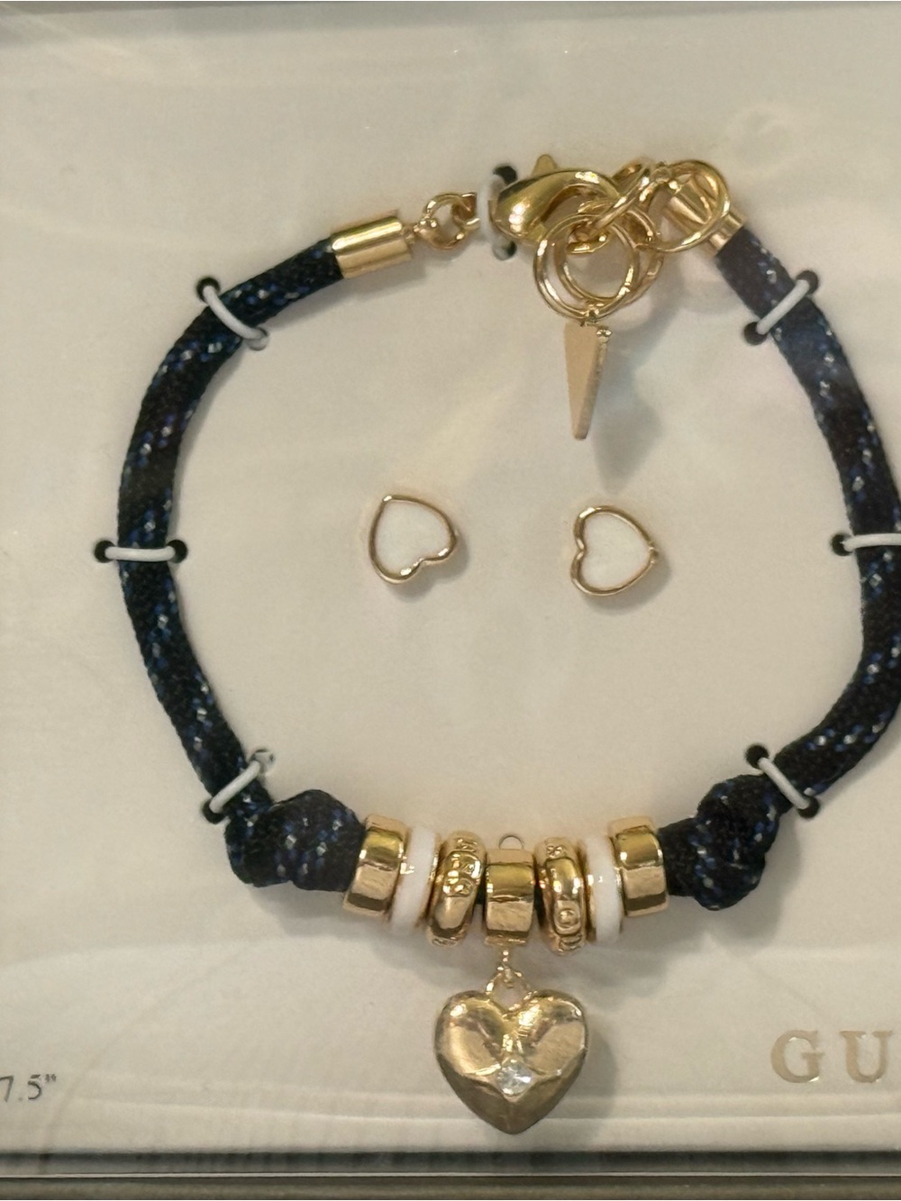 GUESS Gold Heart Charm Bracelet with Navy Cord and Gold Accents